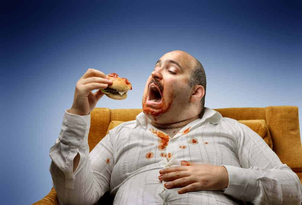What's The Difference Between Gluttony And Greed? (Explained)